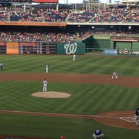 Photo taken at Miller Lite Scoreboard Walk by Kellye A. on 7/5/2013