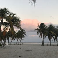 Photo taken at Crandon Park Beach by Tatiana. 🍸🍋☕️✈️ on 1/4/2025