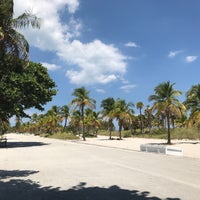 Photo taken at Crandon Park Beach by Tatiana. 🍸🍋☕️✈️ on 9/7/2022