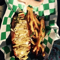 Photo taken at Swizzler Gourmet Hotdogs by Justin G. on 11/15/2014