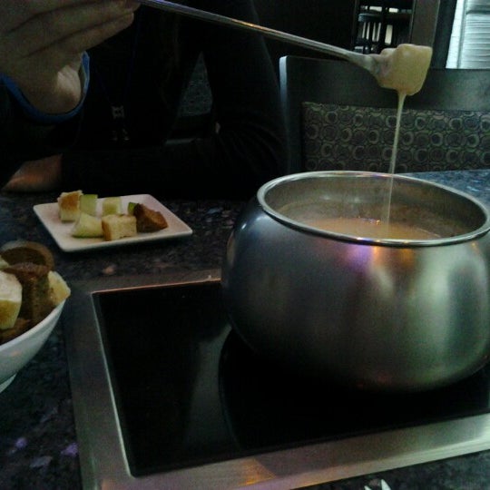 Photo taken at The Melting Pot by Kylie H. on 11/3/2012