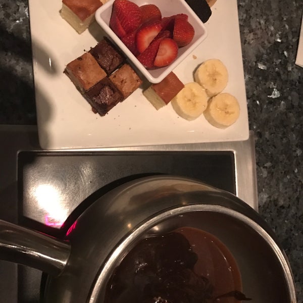 Photo taken at The Melting Pot by Intrepid T. on 4/11/2017