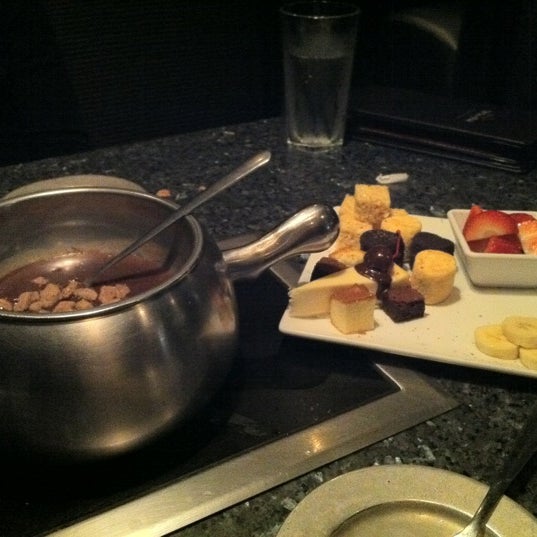 Photo taken at The Melting Pot by Aisha W. on 11/4/2011