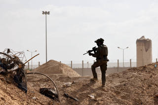 Damaged buildings are pictured in southern Gaza Strip