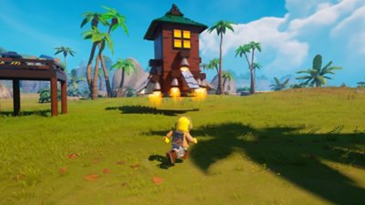 Lego Fortnite Odyssey screenshot showing a LEGO Minifigure character running towards a tower