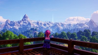 Lego Fortnite Odyssey screenshot showing a LEGO Minifigure character looking out over a mountainous landscape