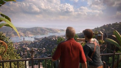 Captura de pantalla de ubicaciones de Uncharted 4 que muestra a Sully (izquierda) y Nathan (derecha) mirando una vista mientras están en Madagascar