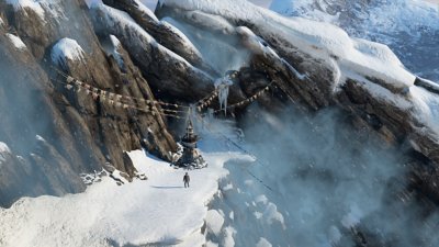 captura de pantalla de uncharted nathan drake collection que muestra a nathan de pie en la nieve en el Himalaya