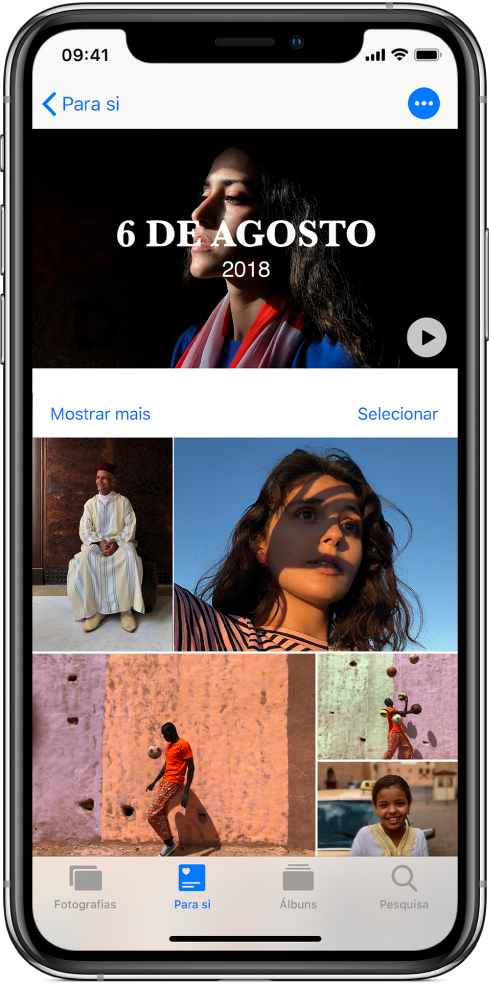 Ecrã Recordações a mostrar um vídeo na parte superior. Por baixo do vídeo encontra-se uma coleção de fotografias.