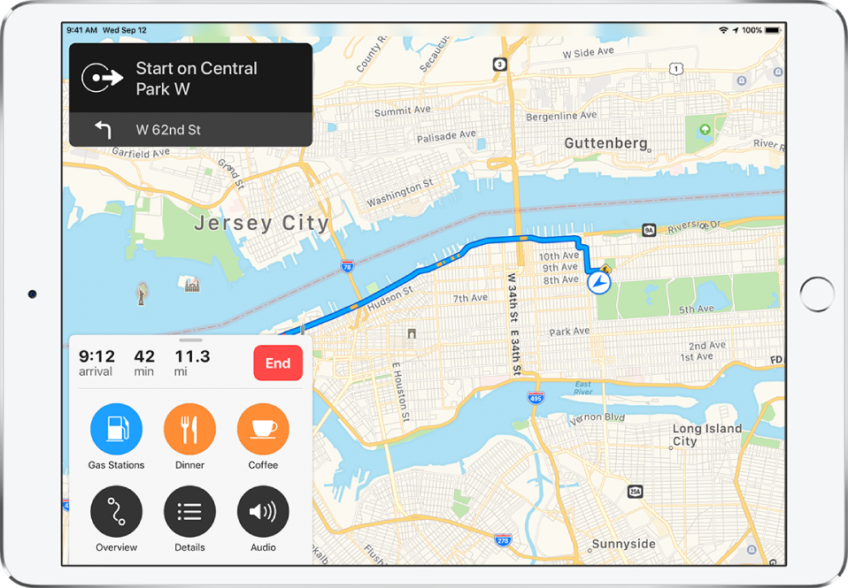 A road map of New York City showing driving directions. A banner in the upper left gives the direction to start on Central Park West, with the next instruction to turn west on 62nd Street. A card in the lower left shows an estimated arrival at 9:12 for a 42 minute drive for 11.3 miles. Appearing on the card is a button, labeled End, to stop navigating. Also appearing on the card are buttons labeled Gas Stations, Dinner, Coffee, Overview, Details, and Audio.