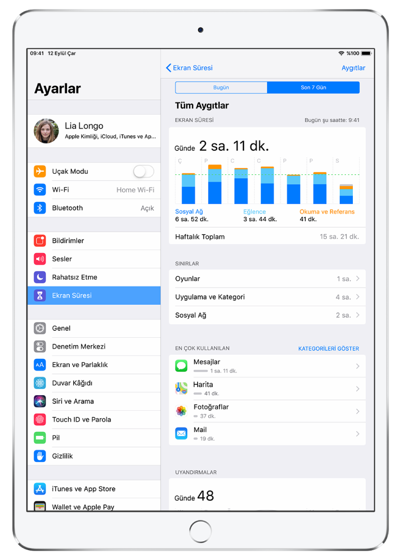 Ekran Süresi Ayarlar’da seçili. Ekranın sağ tarafında Ekran Süresi etkinlik raporu bulunur. Raporun en üstünde Bugün ve Son 7 Gün seçenekleri gösterilir. Son 7 Gün seçili. Raporun en üstünde, haftanın her bir gününde oyun oynama, eğlence ve sosyal ağ için harcanan zamanı gösteren bir grafik bulunur. Grafiğin altında Sınırlar bölümü var. Bu bölümde oyunlar, uygulamalar ve sosyal ağ için süre sınırlarını ayarlayabilirsiniz. Bunun altında, en çok kullanılan uygulamalar listelenir. Raporun en altında, aygıtı toplam kaç kez elinize aldığınız gösterilir.