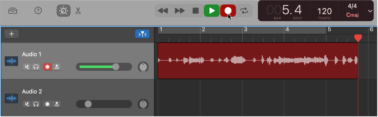 Showing a recorded audio region in red in the Tracks area.