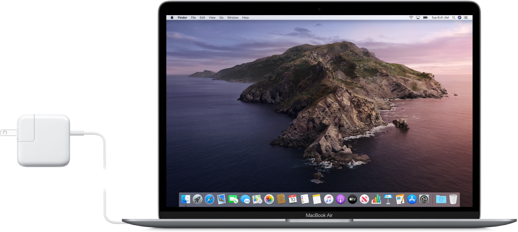 A MacBook Air with the power adapter attached.