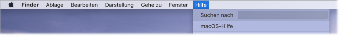 Ein Ausschnitt des Schreibtisch mit dem geöffneten Menü „Hilfe“, in dem die Menüoptionen für die Suche und die macOS-Hilfe zu sehen sind.