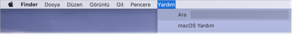 Yardım menüsü açık halde Ara ve macOS Yardım menü seçeneklerini gösteren kısmi masaüstü.