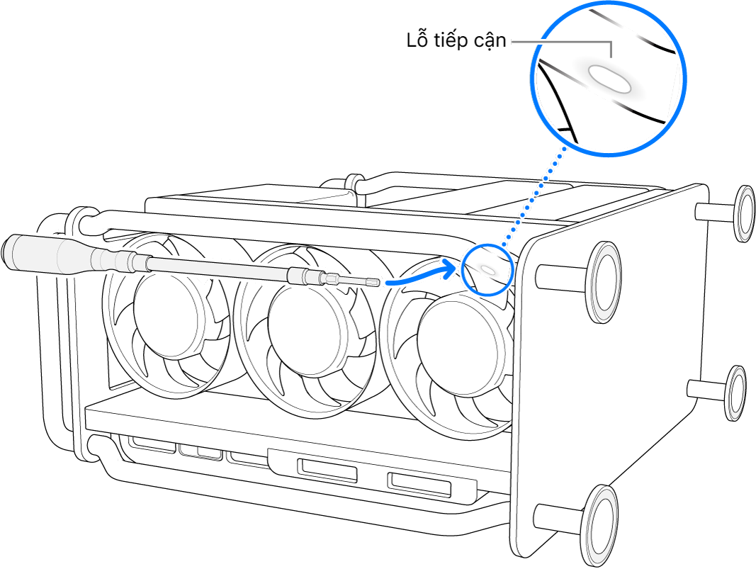 Mac Pro nằm trên mặt bên với một tua-vít đang hướng vào lỗ tiếp cận.