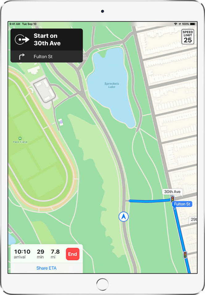 A map showing a driving route, including an instruction to take a right turn on Fulton Street. At the bottom of the map, the arrival time, travel time, and total mileage appear to the left of the End button and above Share ETA.