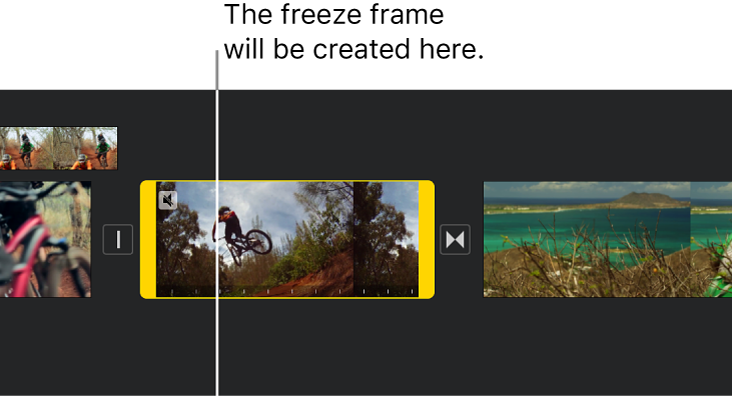 A video clip in the timeline with yellow range handles at each end and the playhead positioned where the freeze frame will be added.