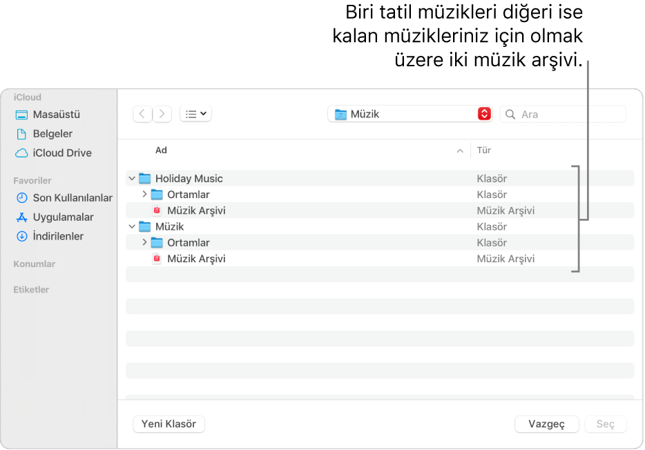 Biri tatil müziği, diğeri de kalan müzikleriniz için olan birden fazla arşiv gösteren Finder penceresi.
