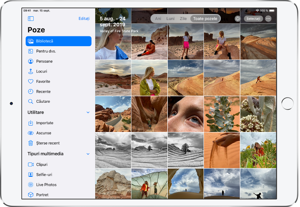În partea stângă a unui ecran din aplicația Poze este o bară laterală de unde puteți selecta Bibliotecă, Pentru dvs., Persoane, Locuri și alte categorii. Opțiunea Bibliotecă este selectată. Restul ecranului afișează biblioteca foto în modul de vizionare Toate pozele. În partea de sus a bibliotecii foto sunt data și locul unde au fost realizate pozele. În centru sus sunt opțiunile de vizualizare a pozelor după Ani, Luni, Zile și Toate pozele. Este selectată opțiunea Toate pozele. În colțul din dreapta sus al ecranului sunt butoanele Aspect, Selectați și Mai multe.