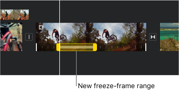 A freeze frame with yellow range handles shown at the bottom of a video clip in the timeline, with the freeze frame beginning at the playhead position.