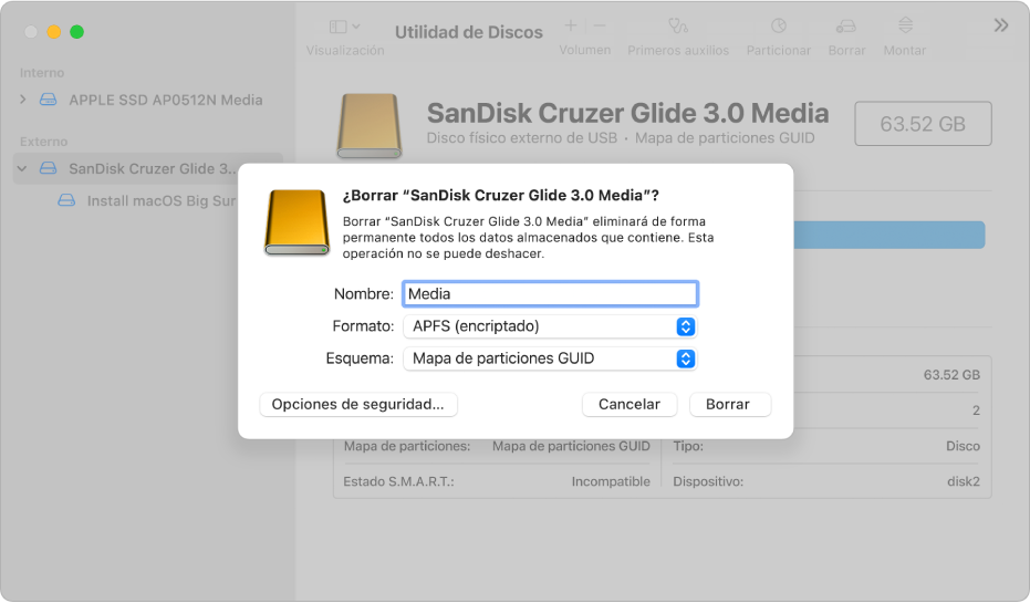 La ventana Utilidad de Discos con la configuración del diálogo Borrar para reformatear una unidad flash con un formato APFS encriptado.