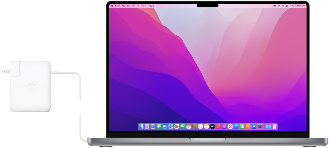 Một MacBook Pro 16 inch với bộ tiếp hợp nguồn được gắn.