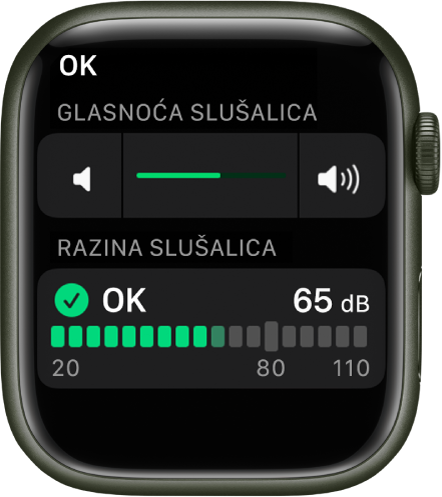 Zaslon Glasnoće slušalice s prikazom kontrole glasnoće pri vrhu i mjerača ispod koji prikazuje trenutačnu glasnoću slušalice. Razina glasnoće iznosi 65 dB i označena je s “OK”.
