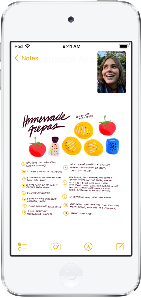 Um ecrã com uma conversa FaceTime em curso enquanto a aplicação Notas preenche o resto do ecrã.