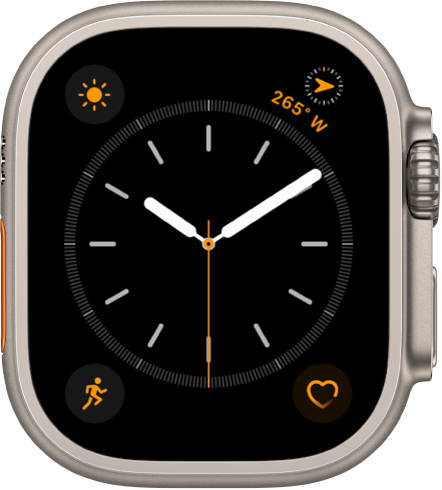 The Simple watch face, where you can adjust the color of the second hand and adjust the numbering and detail of the dial. There are four complications shown: Weather Conditions at the top left, Compass Heading at the top right, Workout at the bottom left, and Heart Rate at the bottom right.