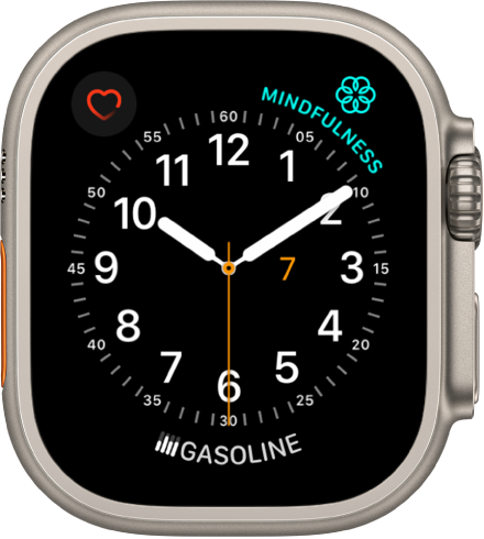 The Utility watch face, where you can adjust the color of the second hand and adjust the numbering and detail of the dial. Three complications appear: Heart Rate at the top left, Mindfulness at the top right, and Music at the bottom.