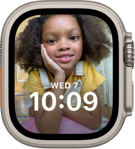 The Portraits watch face shows a photo from your synced photo album. The date and time is in the lower third of the screen.