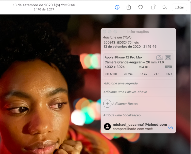 Foto de uma pessoa, com a janela de Informações mostrando o endereço de e-mail do remetente na parte inferior.