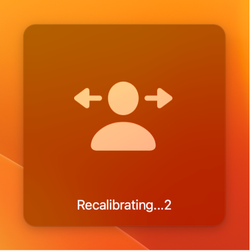 The onscreen countdown for head pointer recalibration, showing “Recalibrating…2.”