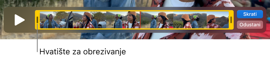 Isječak u prozoru QuickTime Player koji prikazuje dio priloženog isječka u žutim hvatištima, dok je ostatak izvan žutih hvatišta. Tipka Skrati i tipka Odustani nalaze se na desnoj strani.