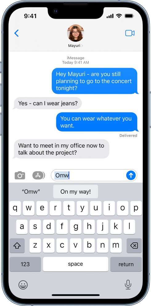 A message with the text shortcut OMW typed and the phrase “On my way!” suggested below as replacement text.