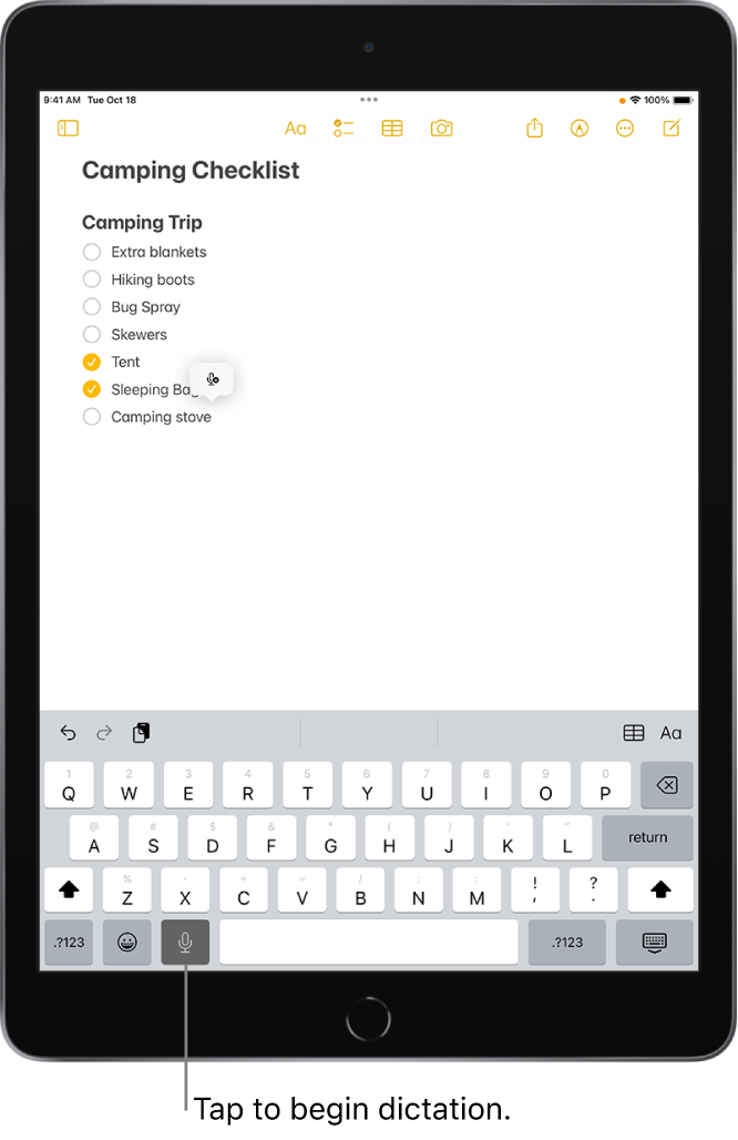 The onscreen keyboard showing the Dictate key (to the left of the Space bar), which you can tap to begin dictating text.