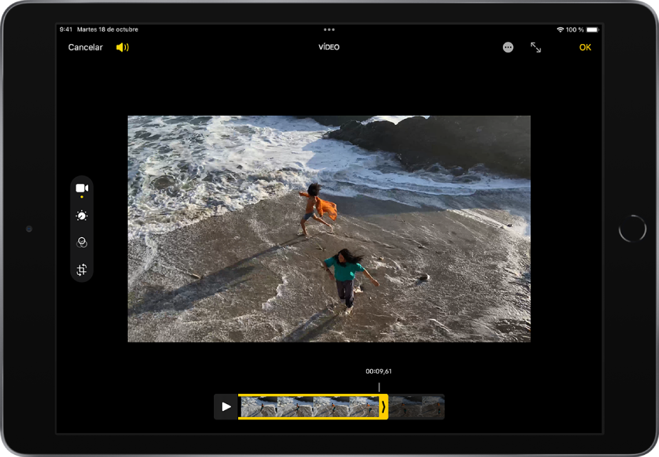 Un vídeo en la pantalla de edición, con el visor de fotogramas del vídeo en la parte inferior de la pantalla. En la esquina superior izquierda están los botones Cancelar y Volumen, y en la esquina superior derecha están los botones “Usar pantalla completa” y OK. Las herramientas de edición se encuentran en la parte izquierda de la pantalla, de arriba a abajo: Vídeo, Ajustar, Filtros y Recortar. Está seleccionado la opción Vídeo.