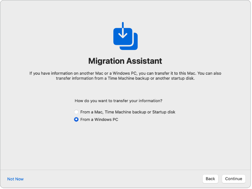 Layar dari Asisten Pengaturan yang bertuliskan “Asisten Migrasi”. Kotak centang untuk mentransfer informasi dari PC Windows dipilih.