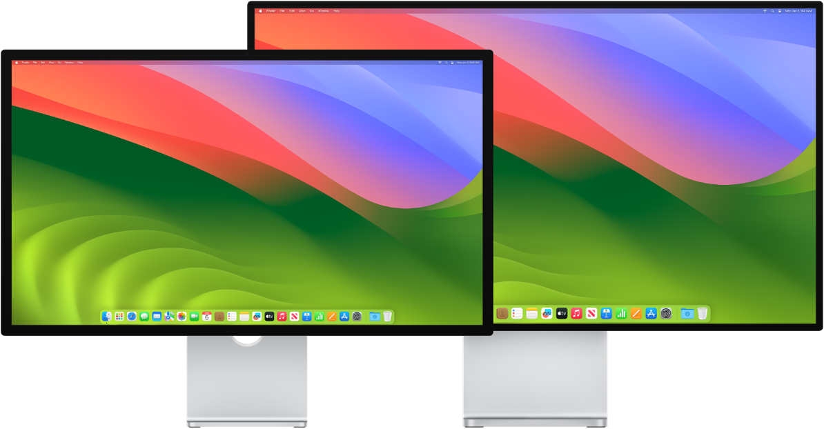 Una pantalla Studio Display al costat d’una pantalla Pro Display XDR.