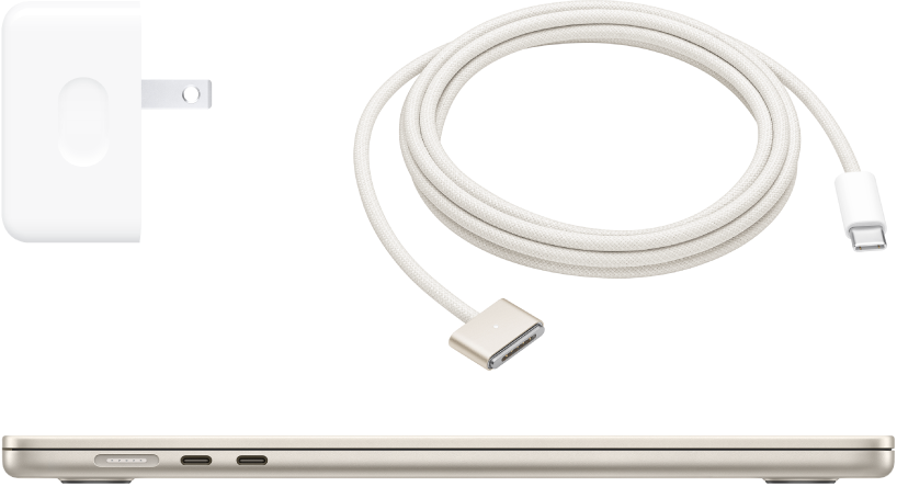 MacBook Airの側面図。同梱のアクセサリがあります。