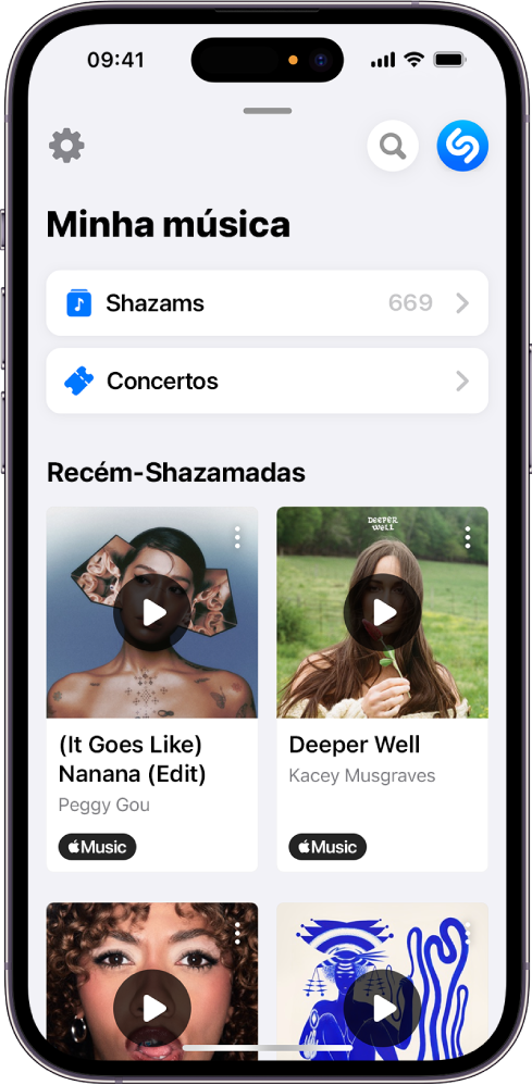 Ecrã Minha música, com um grupo de músicas identificadas através de Auto Shazam