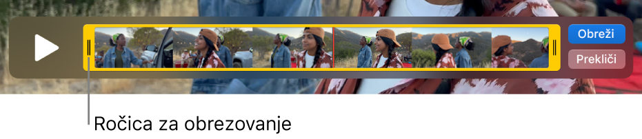 Izrezek v oknu pripomočka QuickTime Player, ki prikazuje del izrezka, obdanega z rumenimi ročicami, in preostanek izrezka izven rumenih ročic. Gumb za obrezovanje in gumb za preklic sta na desni.