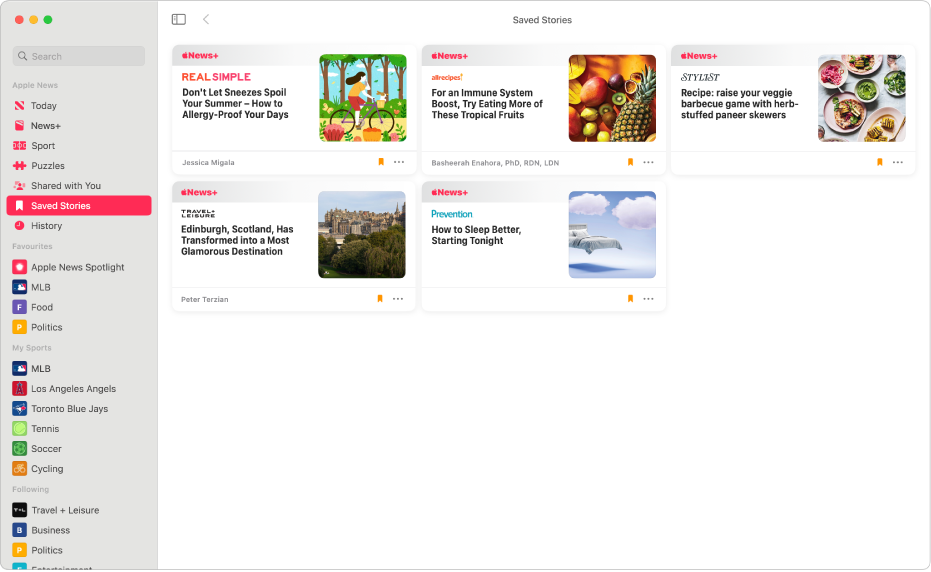 The Apple News window showing Saved Stories selected in the sidebar and four saved stories arranged in a grid on the right.