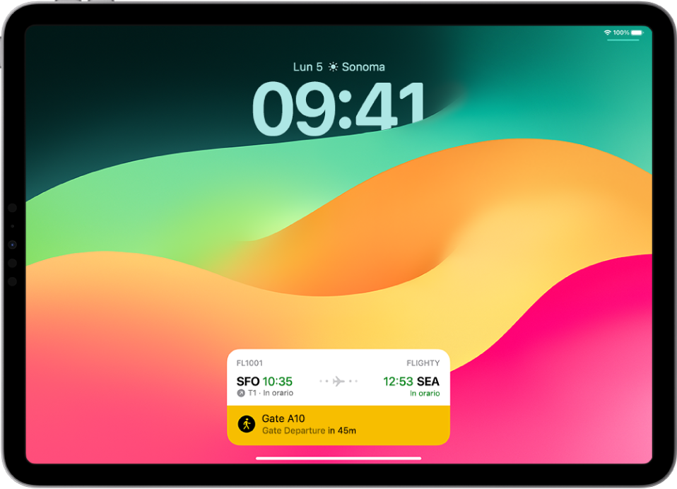 Una schermata di blocco di iPad con un’attività in tempo reale: il monitoraggio di un volo di una compagnia aerea che mostra gli orari e l’intervallo previsto per la partenza.
