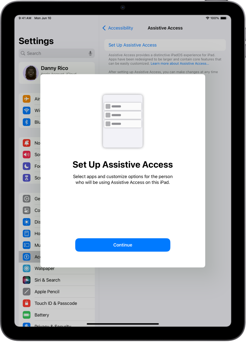 An iPad showing the Assistive Access setup screen with the Continue button at the bottom.