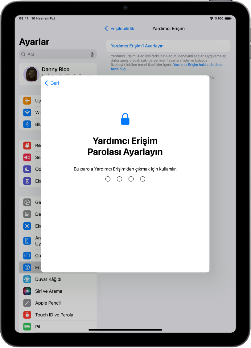 Yardımcı Erişim’e geçerken ve Yardımcı Erişim’den çıkarken kullanılan Yardımcı Erişim parolasını ayarlama ekranını gösteren bir iPad.