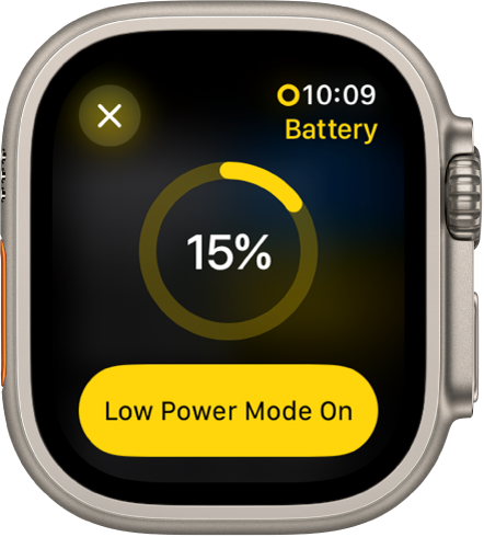 Zaslon načina Low Power Mode (Nizka poraba) z delnim rumenim obročem, ki označuje preostalo napolnjenost. 15 odstotkov je v sredini obroča. Gumb Lower Power Mode On (Nizka poraba vklop) je na dnu. V zgornjem levem kotu je prikazan gumb Close (Zapri).