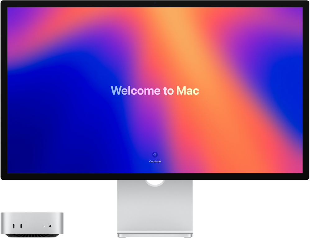 جهاز Mac mini وشاشة عرض Studio Display جنبًا إلى جنب مع كلمة "مرحبًا بك في Mac" على الشاشة.