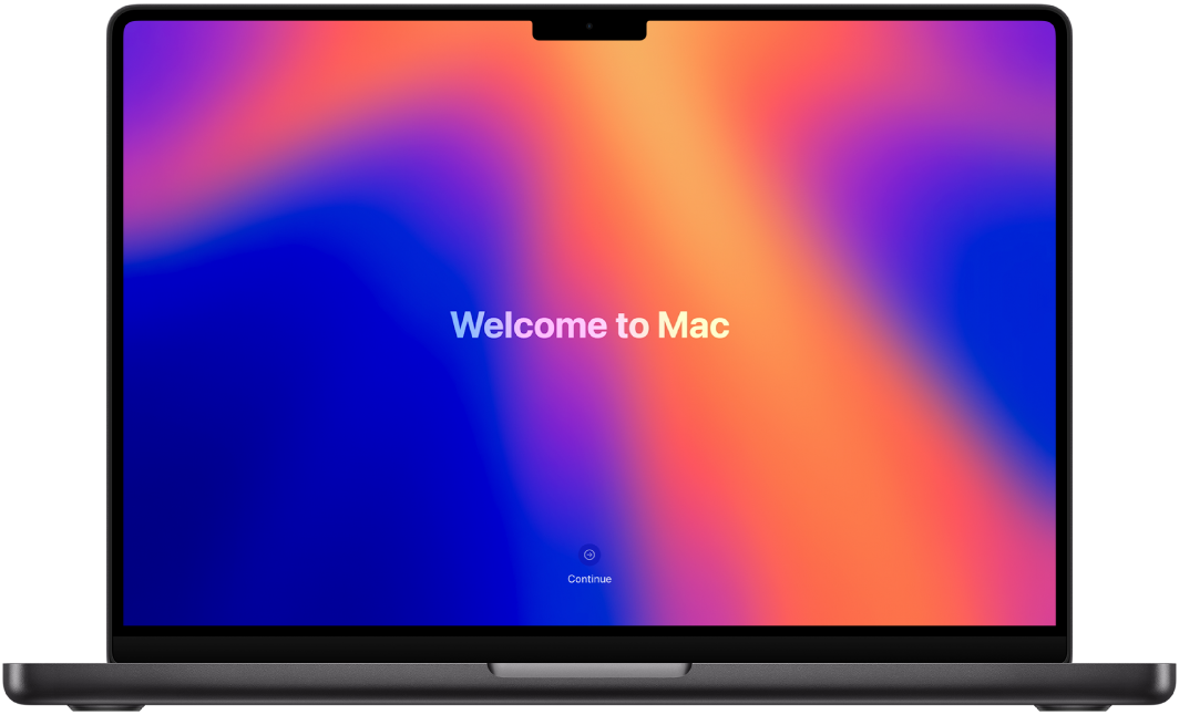 Otevřený MacBook Pro. Na displeji je vidět text „Vítá vás Mac“.